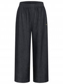 Dunkelgraue Hose mit weitem Bein, elastischem Bund und kleinem Herzdetail, Vorderansicht.